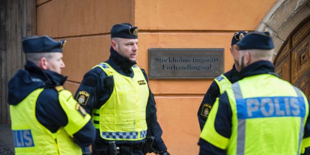 Policemen secure the entrance to the Stockholm District Court where Uzbek national Rakhmat Akilov (not in picture), prime suspect in the Stockholm truck attack, appeared in court on April 11, 2017.
39-year-old Uzbek national Akilov suspected of mowing down a crowd of people on a busy Stockholm street in a stolen truck admitted committing 'a terrorist crime,' his lawyer said. / AFP PHOTO / Jonathan NACKSTRAND (Photo credit should read JONATHAN NACKSTRAND/AFP/Getty Images)