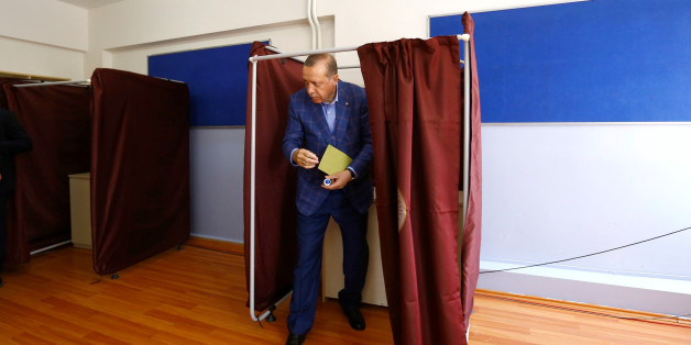 Turkish President Tayyip Erdogan leaves a voting booth at a polling station during a referendum in Istanbul, Turkey, April 16, 2017. REUTERS/Murad Sezer TPX IMAGES OF THE DAY