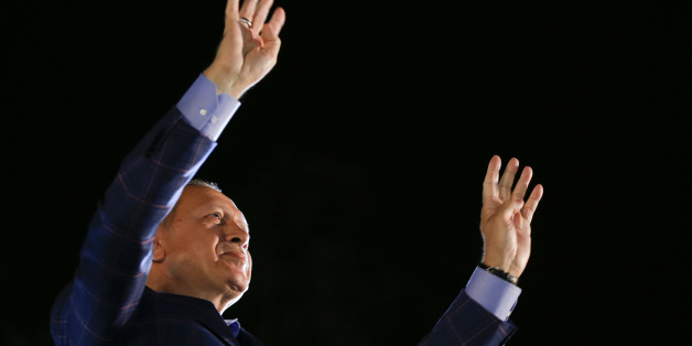 Turkish President Tayyip Erdogan greets his supporters in Istanbul, Turkey, April 16, 2017. REUTERS/Murad Sezer