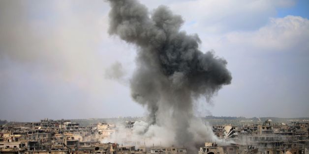 Smoke billows following a reported air strike on a rebel-held area in the southern Syrian city of Daraa, on April 16, 2017. / AFP PHOTO / Mohamad ABAZEED (Photo credit should read MOHAMAD ABAZEED/AFP/Getty Images)