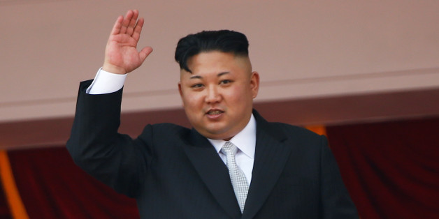 North Korean leader Kim Jong Un waves to people attending a military parade marking the 105th birth anniversary of country's founding father, Kim Il Sung in Pyongyang, April 15, 2017. REUTERS/Damir Sagolj