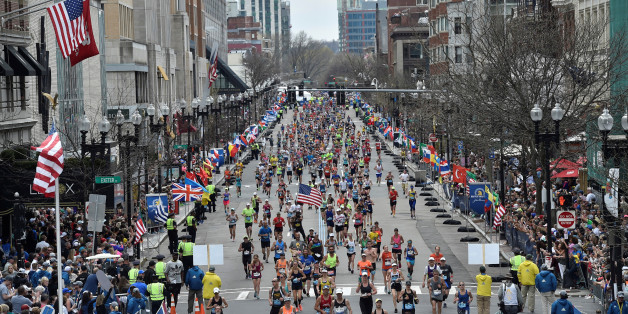 Runners make their way to the finish line 121st Boston Marathon in Boston, Massachusetts, U.S., April 17, 2017. REUTERS/Gretchen Ertl