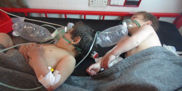 IDLIB, SYRIA - APRIL 4: Children get treatment at a hospital after a suspected chlorine gas attack by Assad Regime forces to Khan Shaykhun town of Idlib, Syria on April 4, 2017.
(Photo by Sadduldin Zaidan /Anadolu Agency/Getty Images)