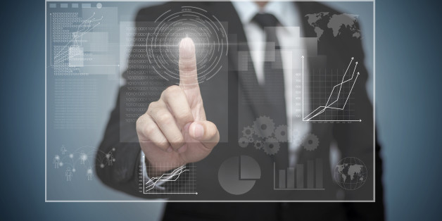 Close up of businessman touching digital screen with fingerClose up of businessman touching digital screen with finger