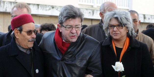 The widow of murdered Tunisian opposition figure Chokri Belaid, Basma Khalfaoui (R), his father Salah Belaid (L) and French left wing party Front de Gauche (FG) leader Jean-Luc Melenchon (C), attend a ceremony marking the second anniversary of his death, on February 6, 2015 in the capital Tunis. Belaid, an anti-Islamist politician, was shot dead by suspected jihadists two years ago. AFP PHOTO / SALAH HABIBI (Photo credit should read SALAH HABIBI/AFP/Getty Images)