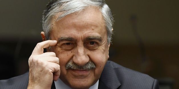 Turkish Cypriot leader Mustafa Akinci gestures during a press conference on UN-sponsored Cyprus peace talks on January 13, 2017 at the Unites Nations headquarters in Geneva.
Hopes for a peace deal in Cyprus stalled on January 13, 2017 over a decades-old dispute, with the rival sides at loggerheads over the future of Turkish troops on the divided island. A week of UN-brokered talks in Geneva between Greek Cypriot President and Turkish Cypriot leader sparked optimism that an agreement to reunify the island could be at hand. But any settlement will require an agreement on Cyprus's future security, with key players Greece, Turkey and former colonial power Britain needing to sign on.
/ AFP / PHILIPPE DESMAZES (Photo credit should read PHILIPPE DESMAZES/AFP/Getty Images)