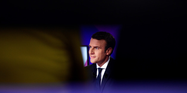 Emmanuel Macron, head of the political movement En Marche!, or Onwards!, and candidate for French 2017 presidential election, attends the France 2 television special prime time political show, "15min to Convince" in Saint-Cloud, near Paris, France, April 20, 2017. REUTERS/Martin Bureau/Pool