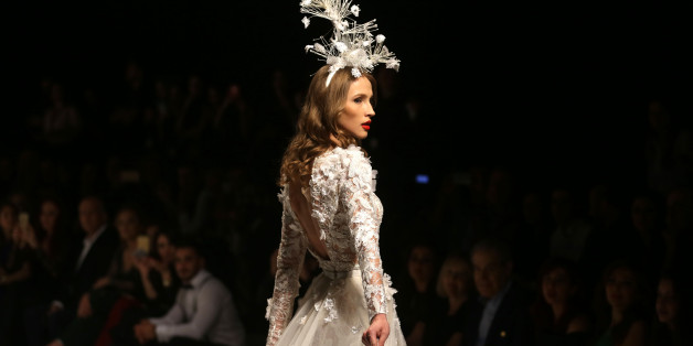 A model displays a dress by Lebanese designer Hanna Touma during the Beirut Fashion Week in the Lebanese capital on April 19, 2017. / AFP PHOTO / PATRICK BAZ (Photo credit should read PATRICK BAZ/AFP/Getty Images)