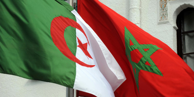 The flags of Algeria (L) and Morocco flutter as Algerian president greets Moroccan Foreign Minister on January 24, 2012 in Algiers. Moroccan Foreign Minister Saad Eddine Othmani yesterday began a fence-mending visit to Algeria to resolve disputes such as the neighbours' lingering row over Western Sahara. AFP PHOTO / FAROUK BATICHE (Photo credit should read FAROUK BATICHE/AFP/Getty Images)