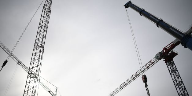 Cranes are pictured at the metro construction site on March 21, 2017 in the French western city of Rennes. / AFP PHOTO / DAMIEN MEYER (Photo credit should read DAMIEN MEYER/AFP/Getty Images)