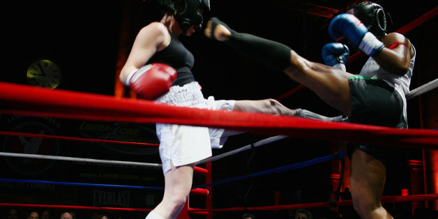 The scene at the Capitale, an old bank on the Bowery that was converted into a nightclub and periodically holds Muay Thai and boxing matches. Local clubs, gyms, and schools participate in the New York Friday Night Fight series, in which a mixture of boxing and Muay Thai matches, both professional and amateur, are scheduled. There can be as many as twenty fights in the night. (Photo by Andrew Lichtenstein/Corbis via Getty Images)