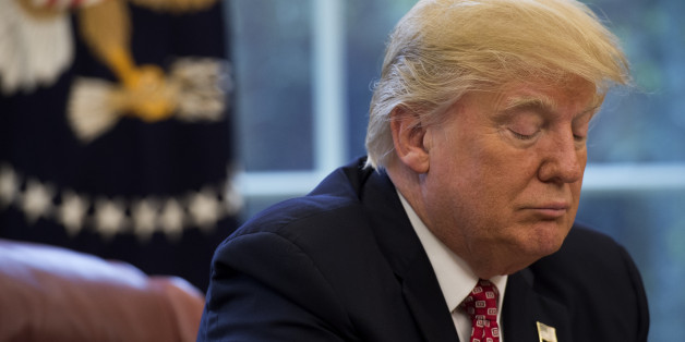 U.S. President Donald Trump listens while holding a video conference to the International Space Station with NASA astronauts, including Peggy Whitson, inside the Oval Office of the White House in Washington, D.C., U.S., on Monday, April 24, 2017. According to NASA, on Monday, Peggy Whitson, the commander of the International Space Station, became the U.S. astronaut with the most time spent in space, passing Jeff Williams's 534 days. Photographer: Molly Riley/Pool via Bloomberg