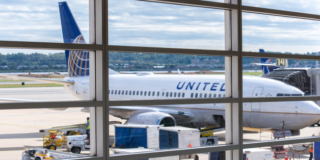 Washington, DC, United States - October 4, 2014: DCA, Reagan National Airport, Washington, DC - View out airport window to airplanes and ramp operations