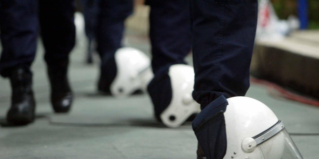 Turkish police helmets lie on the ground as the Turkey v England European Championships qualifying match at the Sukru Saracoglu stadium in Istanbul, Turkey. THIS PICTURE CAN ONLY BE USED WITHIN THE CONTEXT OF AN EDITORIAL FEATURE. NO WEBSITE/INTERNET USE UNLESS SITE IS REGISTERED WITH FOOTBALL ASSOCIATION PREMIER LEAGUE.