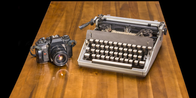 Old typewriter on a wooden desk
