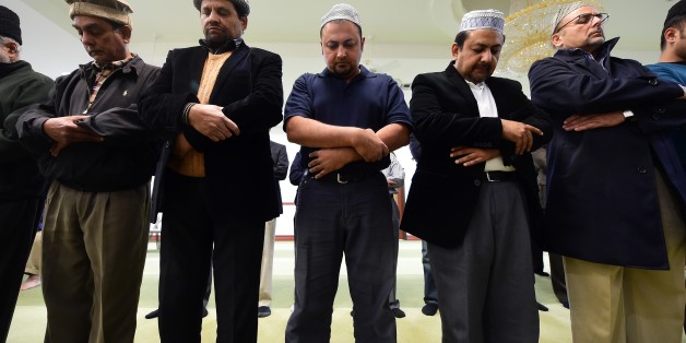 Muslims from the Ahmadiyya Muslim Community pray at the Baitul Hameed Mosque in Chino, California on December 3, 2015, where people attended a prayer vigil to commemorate lives lost a day after the tragedy in San Bernardino. AFP PHOTO/ FREDERIC J. BROWN / AFP / FREDERIC J. BROWN (Photo credit should read FREDERIC J. BROWN/AFP/Getty Images)