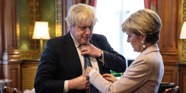LONDON, ENGLAND - FEBRUARY 23: British Foreign Secretary Boris Johnson has his tie straightened by his Australian counterpart Foreign Minister Julie Bishop in his office at the Foreign and Commonwealth Office in Westminster on February 23, 2017 in London, England. Mr Johnson meets with Ms Bishop for the second time since he was promoted to Foreign Secretary in Prime Minister Theresa May's post- Brexit cabinet. Mr Johnson has been keen to commend the U.K.- Australia close friendship and sees the