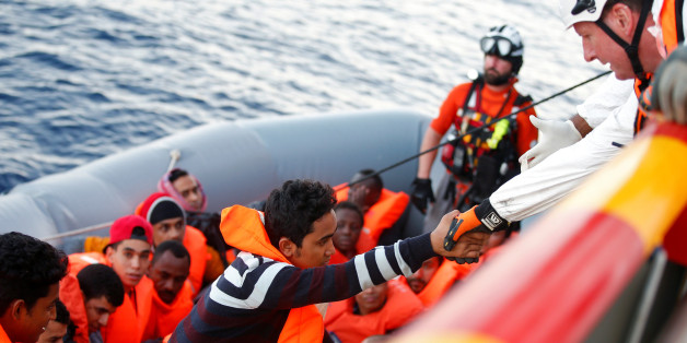 Migrants are seen during rescue operation in the Mediterranea Sea October 20, 2016. Yara Nardi/Italian Red Cross press office/Handout via Reuters ATTENTION EDITORS - THIS IMAGE WAS PROVIDED BY A THIRD PARTY. EDITORIAL USE ONLY.