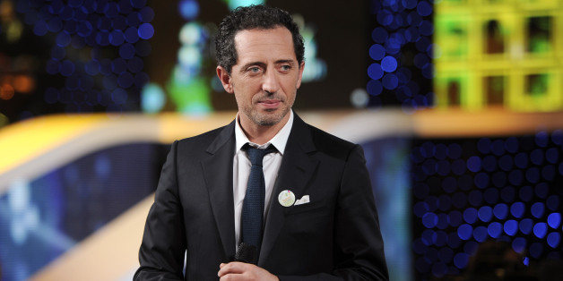 French actor Gad Elmaleh attends the 25th Telethon organised by the French Muscular Dystrophy Association (AFM) in Saint Denis, near Paris December 3, 2011. The annual fundraising event, which is aired live on French television for 30 hours, is held to collect money for research into genetic diseases in children. REUTERS/Gonzalo Fuentes (FRANCE - Tags: ENTERTAINMENT HEALTH)