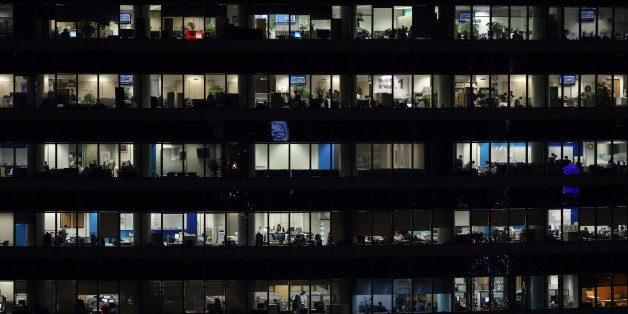 Offices in a building sit illuminated at night in the Gangnam district in Seoul, South Korea, on Monday, Dec. 2, 2013. South Korea's economy will grow 3.9 percent next year - the fastest pace since 2010 - after a 2.8 percent expansion in 2013, the finance ministry projected in September. Photographer: SeongJoon Cho/Bloomberg via Getty Images