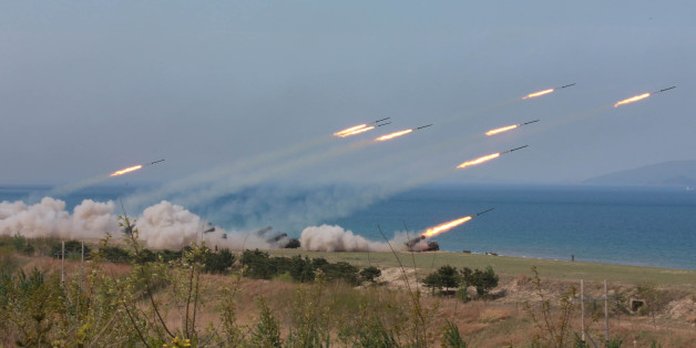 A military drill marking the 85th anniversary of the establishment of the Korean People's Army (KPA) is seen in this handout photo by North Korea's Korean Central News Agency (KCNA) made available on April 26, 2017. KCNA/Handout via REUTERS ATTENTION EDITORS - THIS IMAGE WAS PROVIDED BY A THIRD PARTY. EDITORIAL USE ONLY. REUTERS IS UNABLE TO INDEPENDENTLY VERIFY THIS IMAGE. NO THIRD PARTY SALES. SOUTH KOREA OUT.