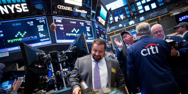 Neil Klompas, chief financial officer of Zymeworks Inc., rings a ceremonial bell during the company's initial public offering (IPO) on the floor of the New York Stock Exchange (NYSE) in New York, U.S., on Friday, April 28, 2017. U.S. stocks remained near record highs, Treasuries dropped and oil closed in on $50 a barrel even after the world's biggest economy reported its slowest pace of expansion in three years. Photographer: Michael Nagle/Bloomberg via Getty Images