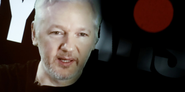 Julian Assange, Founder and Editor-in-Chief of WikiLeaks speaks via video link during a press conference on the occasion of the ten year anniversary celebration of WikiLeaks in Berlin, Germany, October 4, 2016. REUTERS/Axel Schmidt