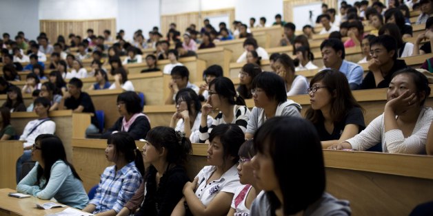 YANJI, CHINA - SEPTEMBER 9: Yanji University of Science and Technology President Kim Chin-Kyung lectures attentive students during freshmen orientation on September 9, 2011 in Yanji, China. (Photo by Benjamin Lowy/Reportage by Getty Images)