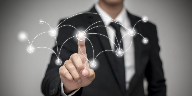 Businessman pressing a spot in the airClose up of businessman touching digital screen with finger