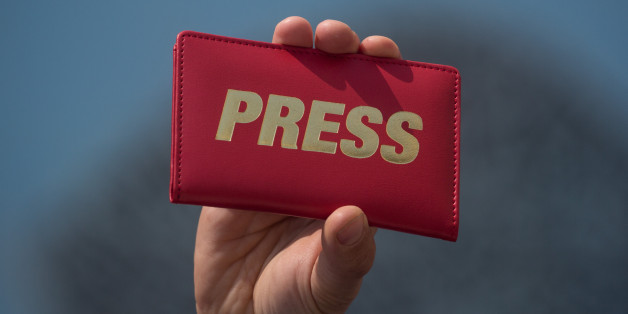 ISTANBUL, TURKEY - MAY 03: A man holds a press card up during a protest held by journalists and members of the Turkish Journalists Union to mark World Press Freedom Day on May 3, 2017 in Istanbul, Turkey. In a statement released by the United Nations, UN Secretary-General Antonio Guterres said 'Journalists go to the most dangerous places. Media workers suffer character assassination, sexual assault, injuries and even death and we need leaders to defend a free media.' In Turkey, since the failed