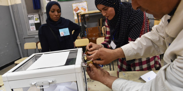 Scrutineers count votes at the end of the Algerian parliamentary elections late on May 4, 2017, in the capital Algiers. / AFP PHOTO / RYAD KRAMDI (Photo credit should read RYAD KRAMDI/AFP/Getty Images)
