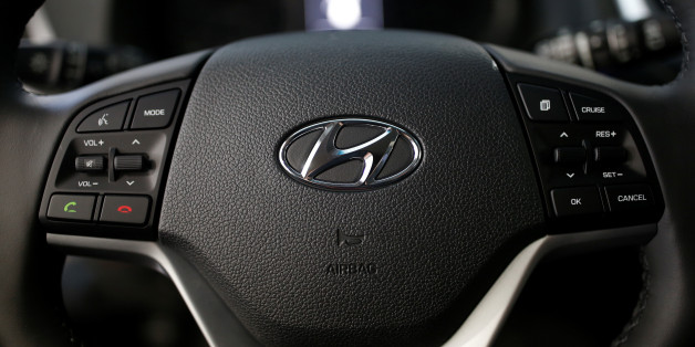 The logo of Hyundai Motor is seen on a steering wheel at its dealership in Seoul, South Korea, December 15, 2016. Picture taken December 15, 2016. REUTERS/Kim Hong-Ji