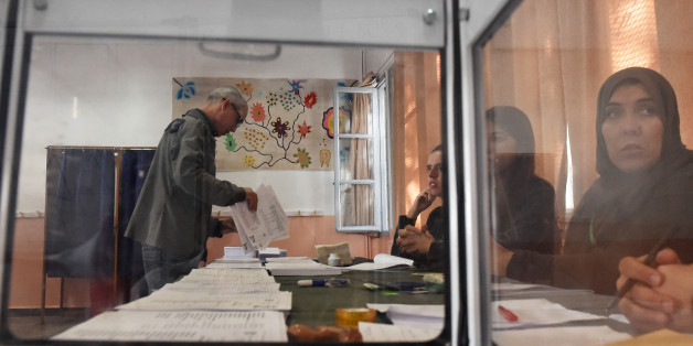 An Algerian man casts his vote at a polling station in Algiers on May 4, 2017 during parliamentary elections. Algerians voted for a new parliament amid soaring unemployment and a deep financial crisis caused by a collapse in oil revenues. / AFP PHOTO / RYAD KRAMDI (Photo credit should read RYAD KRAMDI/AFP/Getty Images)