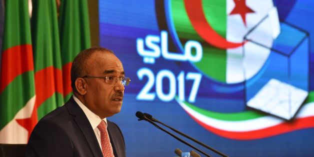 Algerian Interior and Territorial Collectivities Minister Noureddine Bedoui announces the results of the country's legislative elections in Algiers on May 5, 2017. The party of Algerian President Abdelaziz Bouteflika and its coalition ally have won a clear majority of the seats in parliament, results released by the interior ministry showed. / AFP PHOTO / RYAD KRAMDI / RYAD KRAMDI (Photo credit should read RYAD KRAMDI/AFP/Getty Images)