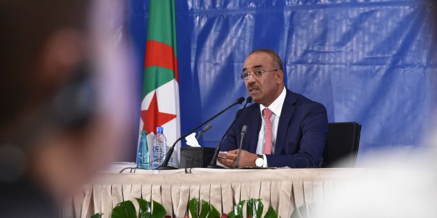 Algerian Interior and Territorial Collectivities Minister Noureddine Bedoui announces the results of the country's legislative elections in Algiers on May 5, 2017. The party of Algerian President Abdelaziz Bouteflika and its coalition ally have won a clear majority of the seats in parliament, results released by the interior ministry showed. / AFP PHOTO / RYAD KRAMDI / RYAD KRAMDI (Photo credit should read RYAD KRAMDI/AFP/Getty Images)