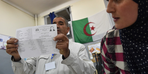 Scrutineers count votes at the end of the Algerian parliamentary elections late on May 4, 2017, in the capital Algiers. / AFP PHOTO / RYAD KRAMDI (Photo credit should read RYAD KRAMDI/AFP/Getty Images)