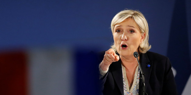 Marine Le Pen, French National Front (FN) political party leader and candidate for French 2017 presidential election, attends a political rally in Arcis-sur-Aube, near Troyes, France April 11, 2017. REUTERS/Benoit Tessier