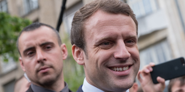 Emmanuel Macron, French presidential candidate, reacts during an election campaign event in Rodez, France, on Friday, May 5, 2017. French voters face a stark choice in Sundays presidential election between joining the wave of populism that has swept across some rich democracies in the past year or an attempt to renew the governing principles that have guided their country for decades. Photographer: Balint Porneczi/Bloomberg via Getty Images