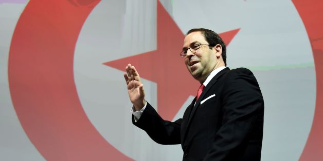 Tunisian Prime Minister Youssef Chahed delivers a speech on the second and last day of the 'Tunisia 2020' conference, on November 30, 2016, in Tunis. / AFP / FETHI BELAID (Photo credit should read FETHI BELAID/AFP/Getty Images)