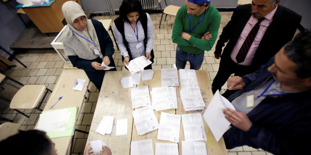 Election workers count ballots at the end of voting for the parliamentary election in Algiers, Algeria, May 4, 2017. REUTERS/Ramzi Boudina