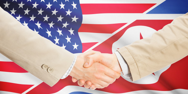 Businessmen shaking hands - United States and North Korea