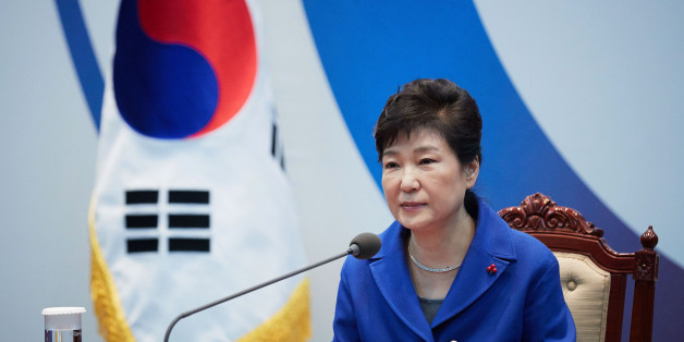 SEOUL, SOUTH KOREA - DECEMBER 09: In this handout photo released by the South Korean Presidential Blue House, South Korea's President Park Geun-Hye attends the emergency cabinet meeting at the presidential office on December 9, 2016 in Seoul, South Korea. The South Korean National Assembly voted for an impeachment motion at its plenary session, which will set up the rare impeachment trial for President Park over the accusation of corruption involving Park and her long time confidante. (Photo b