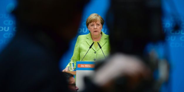 German Chancellor Angela Merkel gives a press conference in Berlin on May 8, 2017, one day after regional elections in the northern state of Schleswig-Holstein.
Merkel's conservatives secured a strong win in state polls in northern Germany, giving a boost to her bid to retain power in national elections in September. / AFP PHOTO / John MACDOUGALL (Photo credit should read JOHN MACDOUGALL/AFP/Getty Images)