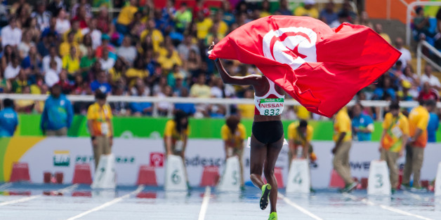RIO DE JANEIRO, BRAZIL - SEPTEMBER 10: Somaya Bousaid of Tunesia competes and wins the Women's 1500m Final T13 on day 3 of the Rio 2016 Paralympic Games at the Olympic Stadium on September 10, 2016 in Rio de Janeiro, Brazil. (Photo by Helene Wiesenhaan/Getty Images)