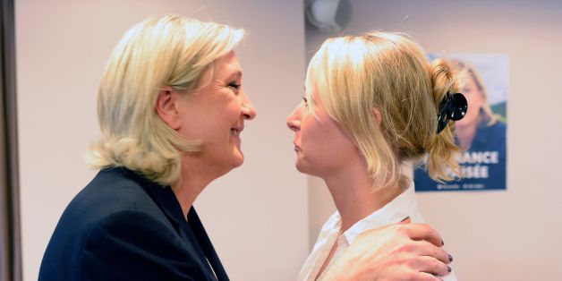 French far-right Front National (FN) party President and member of the European Parliament Marine Le Pen (L) greets her niece FN MP Marion Marechal-Le Pen after delivering a press conference in Nanterre, near Paris, on July 16, 2016, regarding the July 14 attack in Nice.
Marine Le Pen, head of the far-right National Front party, on July 16 called on France's interior minister to quit after the deadly Nice truck attack. 'In any other country in the world a minister with a toll as horrendous as Bernard Cazeneuve -- 250 dead in 18 months -- would have quit,' she told a news conference at her party's headquarters.
/ AFP / ALAIN JOCARD (Photo credit should read ALAIN JOCARD/AFP/Getty Images)