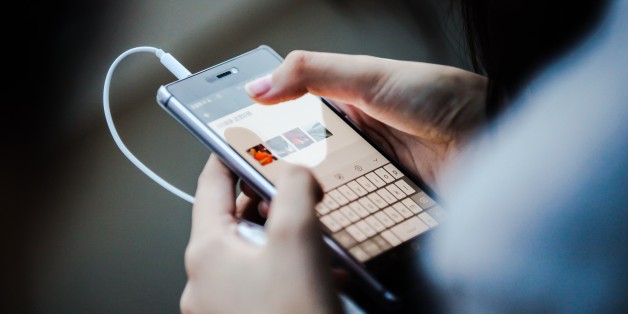 A Chinese girl is posting photos to WeChat taken in Japan.