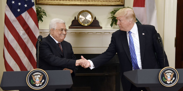 U.S. President Donald Trump shakes hands with Mahmoud Abbas, president of Palestine, left, during a joint press conference in the Roosevelt Room of the White House in Washington, D.C., U.S., on Wednesday, May 3, 2017. Trump welcomed Abbas to the White House on Wednesday as the U.S. president weighs how to approach a Middle East conflict that has eluded resolution for seven decades. Photographer: Olivier Douliery/Pool via Bloomberg