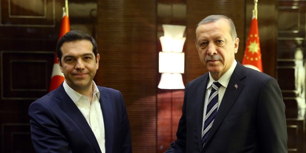 BEIJING, CHINA - MAY 13 : Turkish President Recep Tayyip Erdogan (R) and Greek Prime Minister Alexis Tsipras (L) shake hands as they pose for a photo before their meeting in Beijing, China on May 13, 2017. (Photo by Kayhan Ozer/Anadolu Agency/Getty Images)