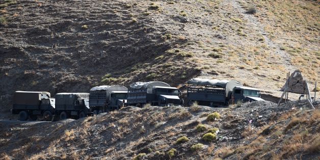 Algerian army troops carry out search operations in the mountainous eastern Tizi Ouzou region in a desperate bid to find French hiker Herve Gourdel who was kidnapped by militants linked to the Islamic State group who have threatened to execute him on September 23, 2014 near the village of Ait Ouaban, 80 km south of Tizi Ouzou. Paris vowed it would not negotiate with jihadists, as the local army raced against time to find him before his threatened execution. AFP PHOTO / FAROUK BATICHE (P