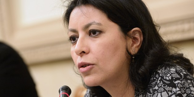 French left-wing EELV party member and Senator of Paris Leila Aichi talks during a meeting at the National Assembly in Paris on April 4, 2015. AFP PHOTO/ BERTRAND GUAY (Photo credit should read BERTRAND GUAY/AFP/Getty Images)